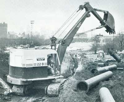 Cable-operated diesel excavator on a job site